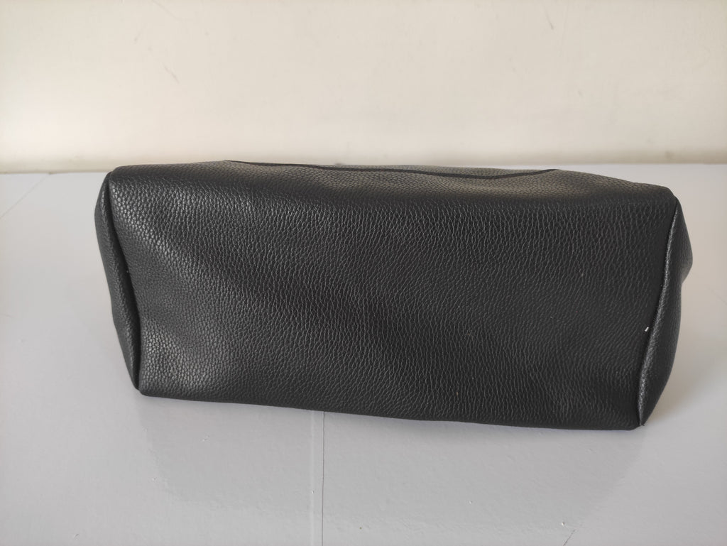 Black textured rectangular pouch with zipper on a white background